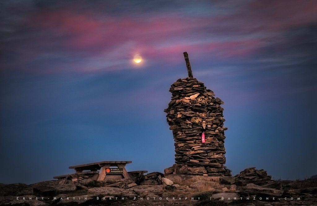 Rising moon at sunset